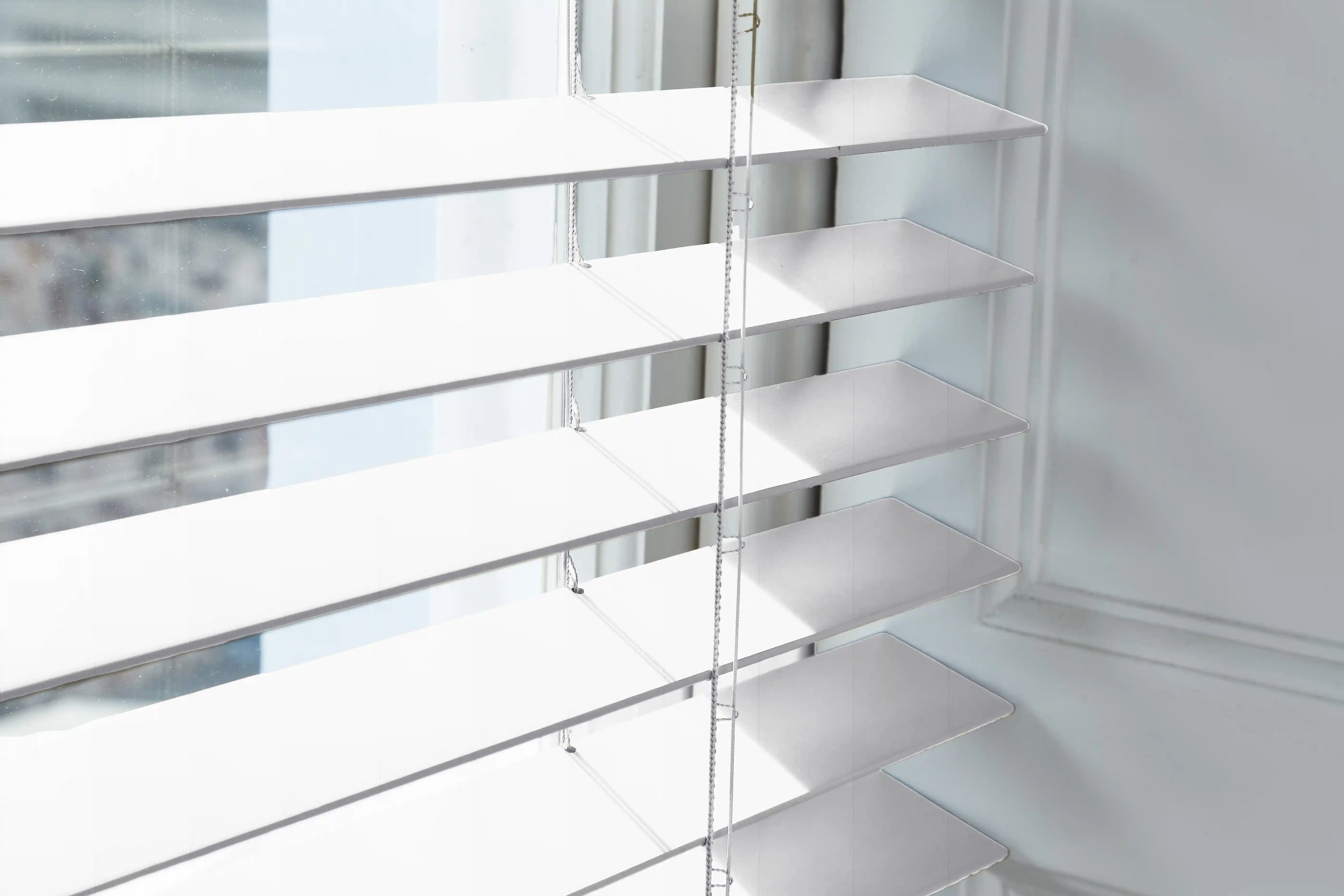 Shop custom-sized Faux Wood Blinds a perfect alternative to real wood.