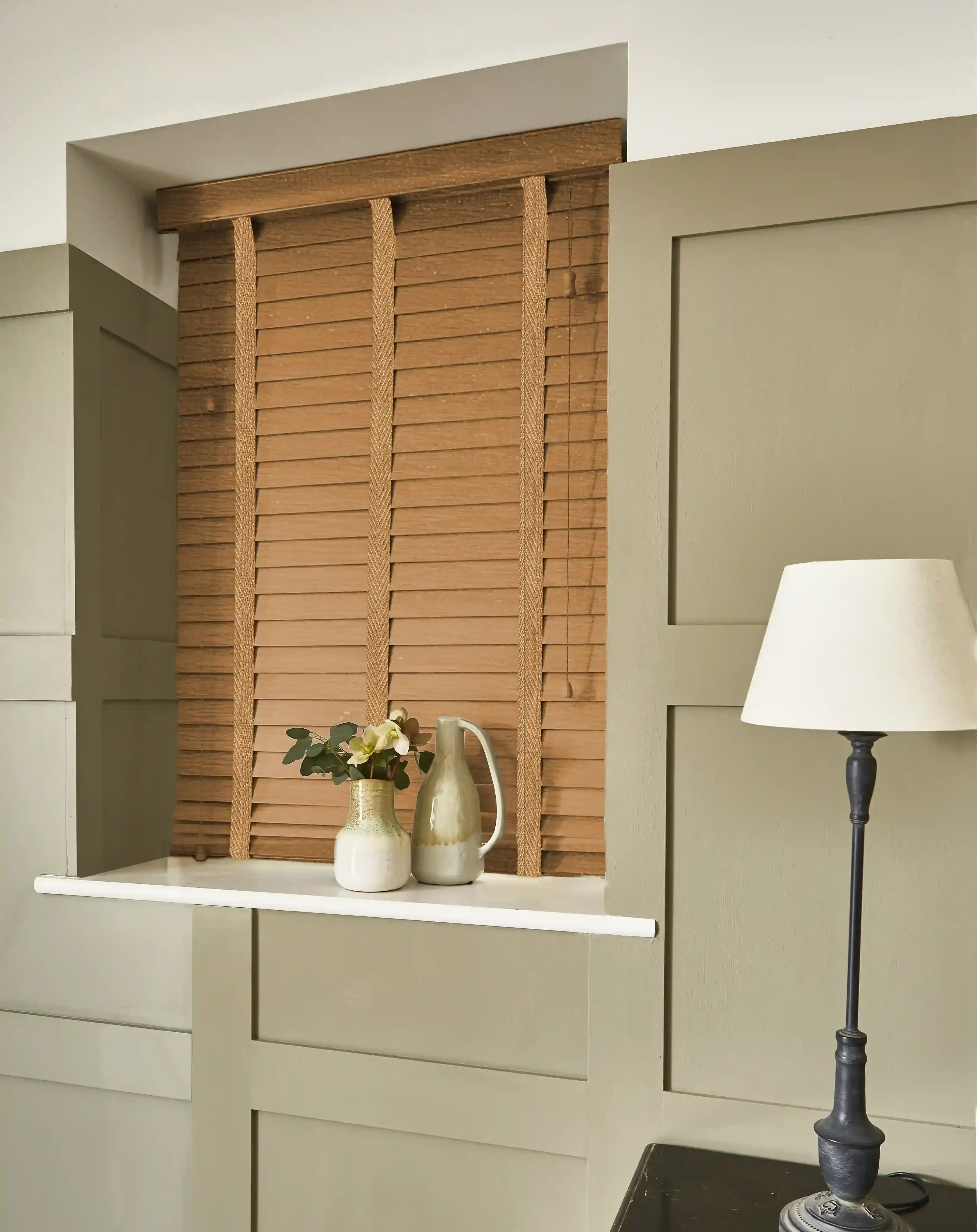 Dark wood blinds for a bold and sophisticated interior.