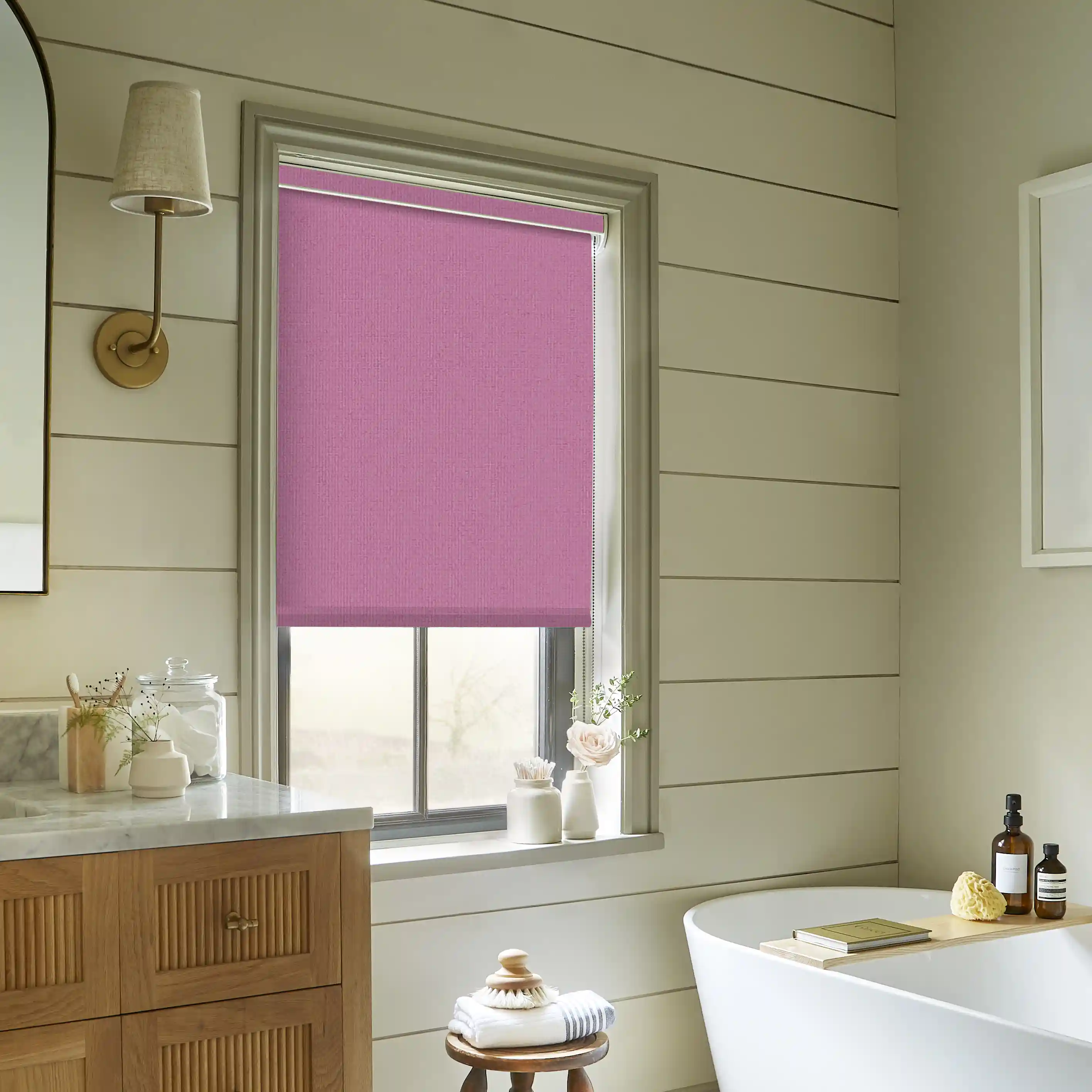 Waterproof bathroom blinds double as the perfect moisture-resistant kitchen roller shades.