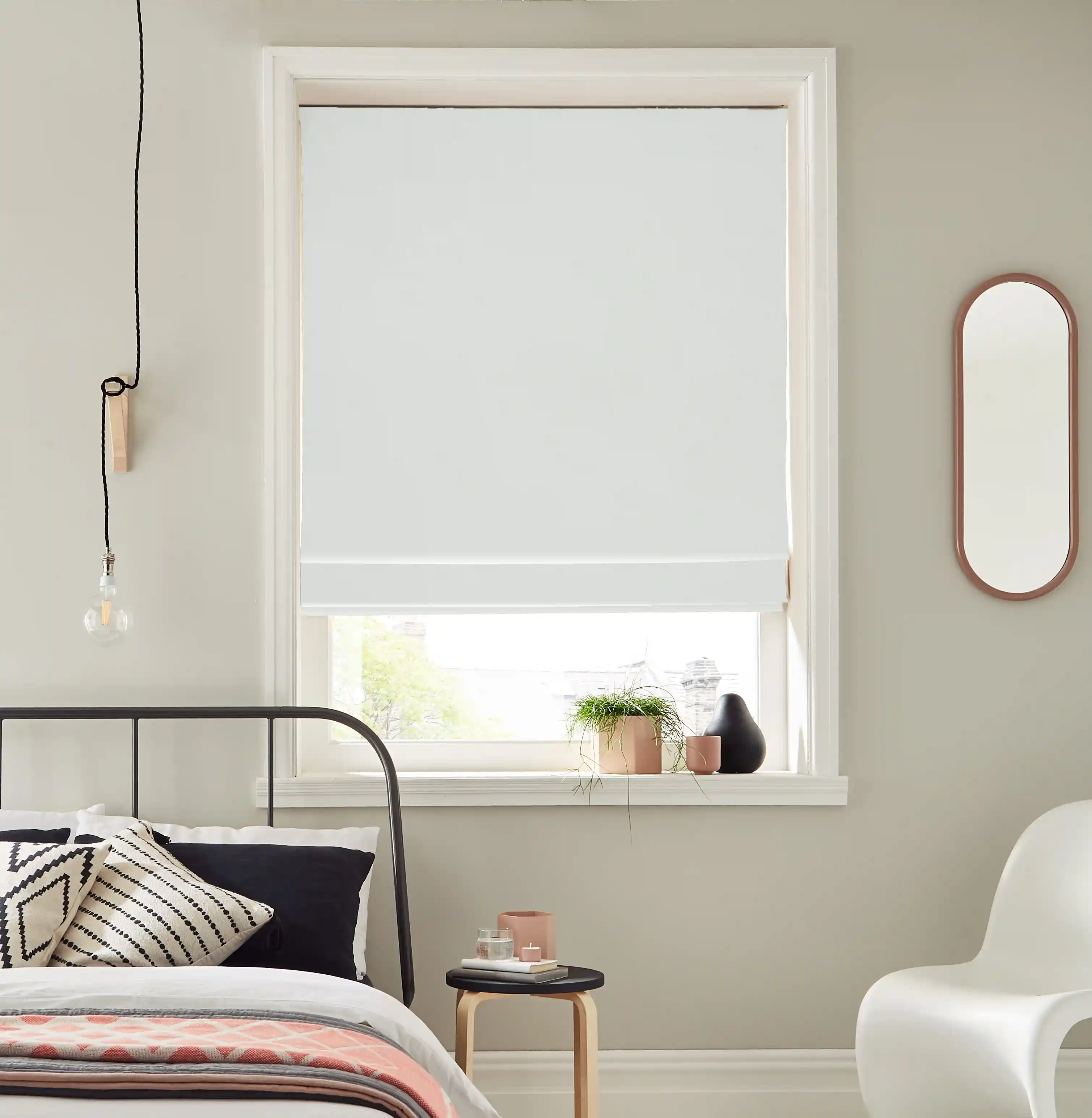 Roman Blinds for Small Windows in Taunton—Enhance your small windows with Roman blinds designed to provide both privacy and elegance.